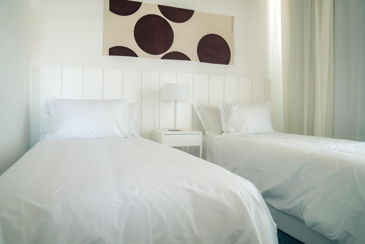 Casagrande Hotel & Beach Club José Ignacio Eksteriør billede A bedroom with two single beds